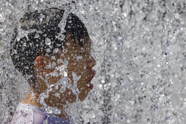  CHINA CALOR – El intenso calor en varias provincias chinas se mantendrá hasta final de mes